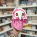 Mini Squishable Sakura Plague Nurse plush toy with pink fur, white plague mask, floral cloak and tiny basket