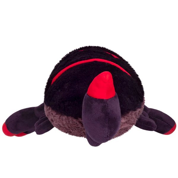 Back view of Mini Squishable Scorpion plush showing red-striped body and pointed tail tip.