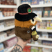 Mini Squishable Steampunk Plague Doctor plush toy held in hand, side view