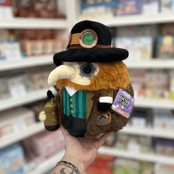 Mini Squishable Steampunk Plague Doctor plush toy held in hand with tag visible