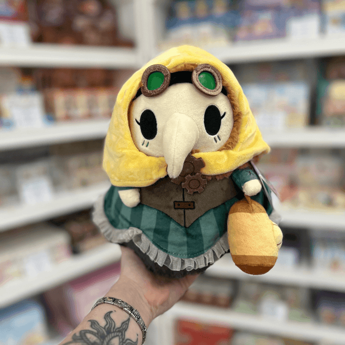 Mini Squishable Steampunk Plague Nurse plush toy held in hand, front view