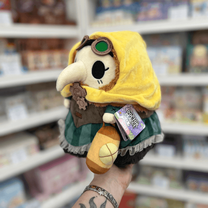 Mini Squishable Steampunk Plague Nurse plush toy held in hand with tag visible
