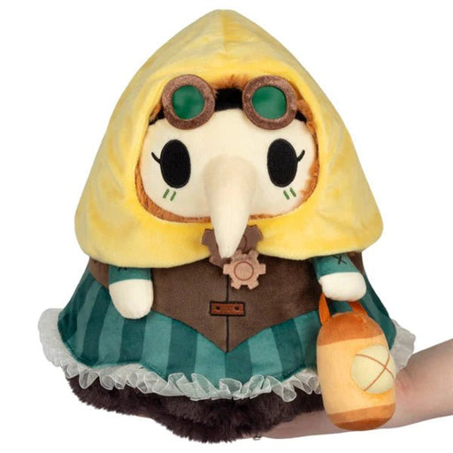 Mini Squishable Steampunk Plague Nurse plush with yellow hood, goggles, and lantern accessory.