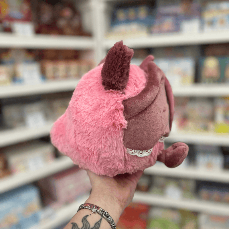 Mini Squishable Sweetheart Bat plush toy held in hand, side view