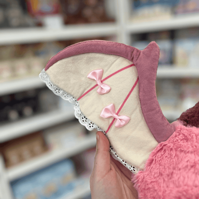 Close-up of Mini Squishable Sweetheart Bat plush wing showing lace trim and pink bow details