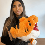 Mini Squishable Tiger Shark plush toy being held for size comparison