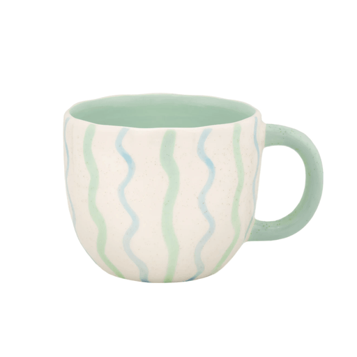 Mint green Surprise Penguin Mug with blue and green wavy stripe design