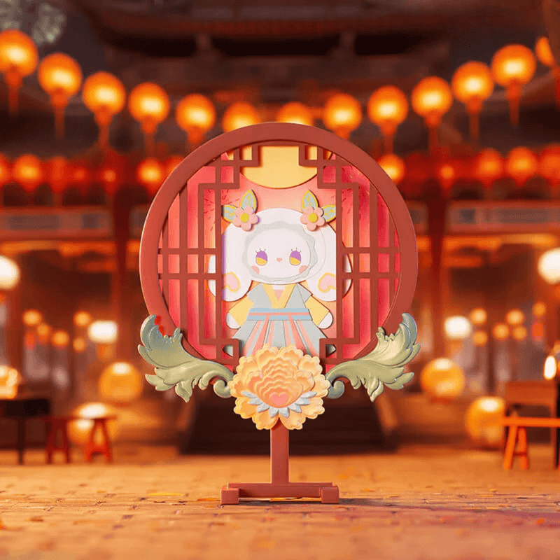 EMMA Lantern Festival Fireworks figure with round red lantern frame and peony base, night market backdrop.
