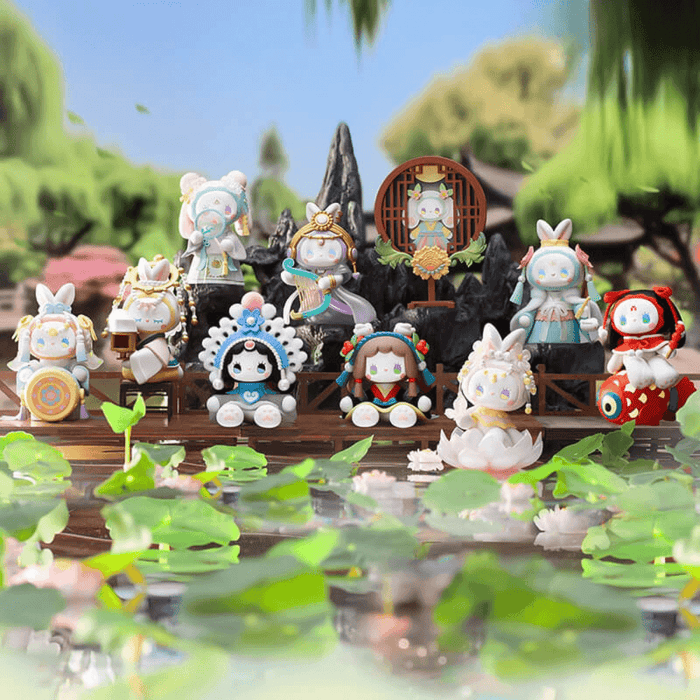 Group photo of EMMA Lantern Festival figures by a pond, including hidden Carp Lamp and Palace Lantern.