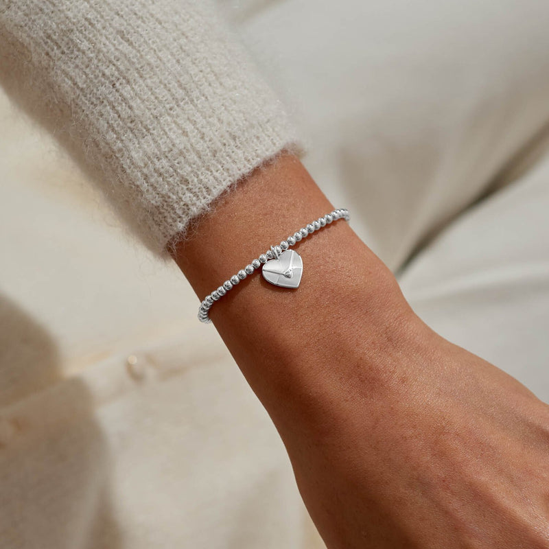 Joma Jewellery Sending Love Bracelet worn on wrist