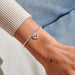 Silver-plated Joma Jewellery beaded Bracelet worn on wrist with crystal heart halo charm, Love You Mummy Mother’s Day gift.