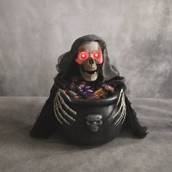 Motion-sensor Halloween treat bowl shaped like a reaper cauldron

