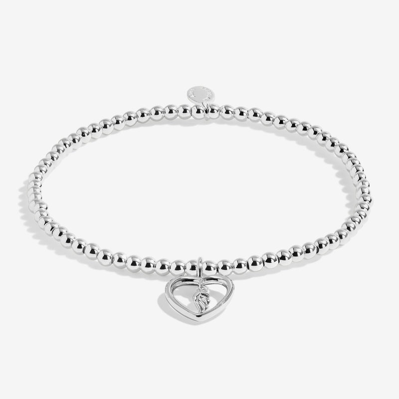 Full view of Joma Jewellery A Little Mums Are Angels In Disguise Bracelet, silver-plated beaded stretch Bracelet with heart and feather charm.