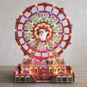 LED Santa Ferris wheel glowing on a tabletop display

