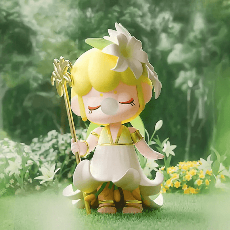Lily figure, pastel‑yellow pixie with flower staff and white‑petal gown
