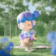Little Pool figure, blue‑haired pixie perched on fountain bowl, Nanci Secret Garden collectable
