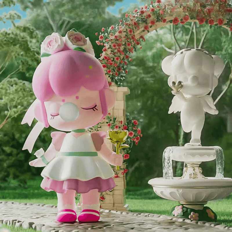 Multiflora figure, pink‑haired pixie beside cherub fountain arch, Secret Garden Blind Box series
