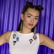 Model wearing Netflix K-POP Demon Hunters enamel pins on a white top against a purple backdrop