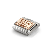 Angled close-up of Nomination 2027 Rose Gold Link showing raised plaque, etched numerals and decorative scrollwork.