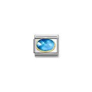 Nomination Classic Link with blue–light blue faceted glass oval in yellow-gold bezel on stainless steel, front view.