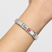 Nomination Composable bracelet on wrist with Classic Double Link engraved Love and red enamel flower with white CZ.