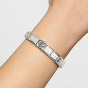 Nomination bracelet shown on wrist with Soul Sister heart link charm