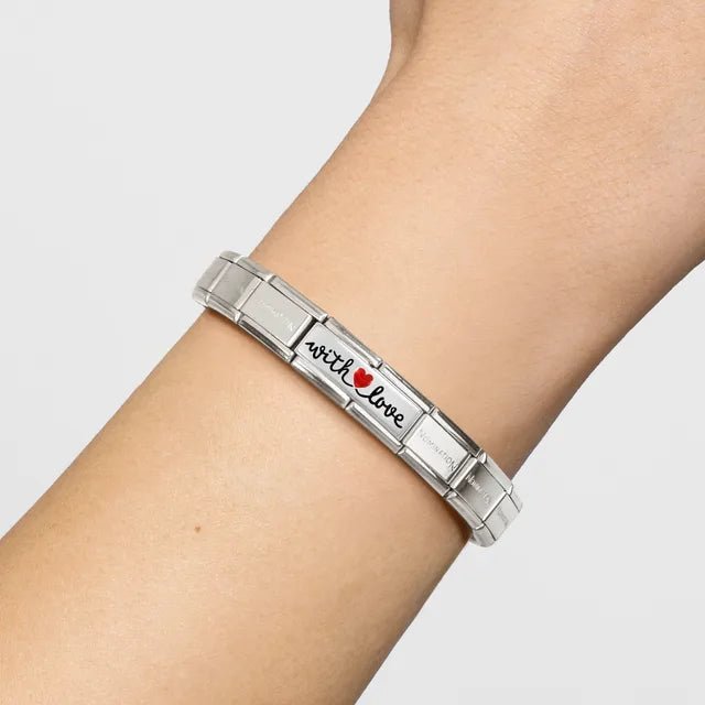Nomination Bracelet with With Love Double Link in silver with red enamel heart on wrist.