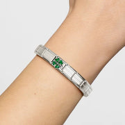 Nomination Classic Bracelet on wrist featuring the Green Clover Classic Link charm in stainless steel, silver and enamel