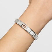 Nomination Classic Bracelet on wrist featuring the Pisces zodiac Classic Link in rose gold and stainless steel