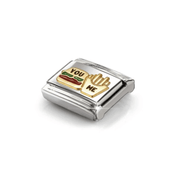 Angled view of Nomination yellow gold burger and fries charm with coloured enamel