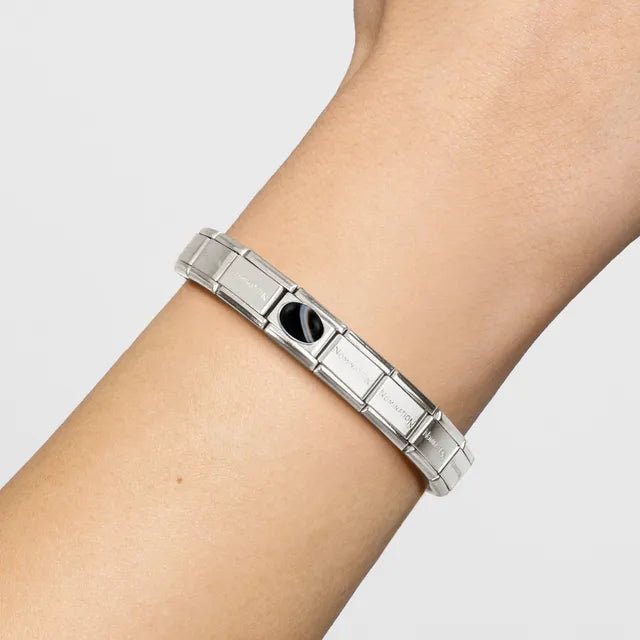 Classic Nomination Bracelet worn with banded onyx silver link