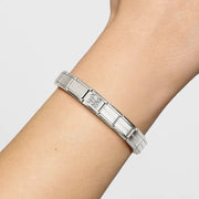 Nomination Classic Link number 16 with white CZ in sterling silver, shown on a stainless steel Composable bracelet