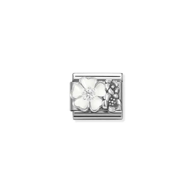 Nomination Classic Link with two raised flowers: white enamel bloom with CZ and smaller oxidised silver flower.