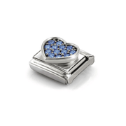 Angled view of Nomination silver heart charm set with light blue Cubic Zirconia