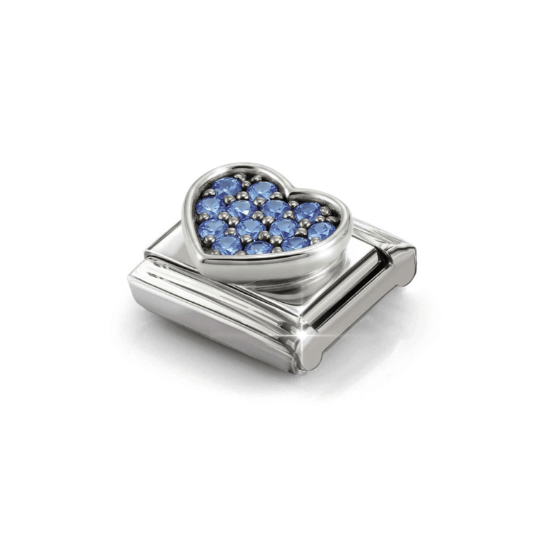 Angled view of Nomination silver heart charm set with light blue Cubic Zirconia