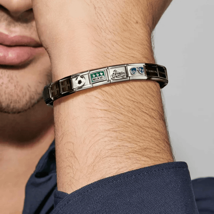Nomination Composable Classic bracelet lifestyle image with travel themed charm links
