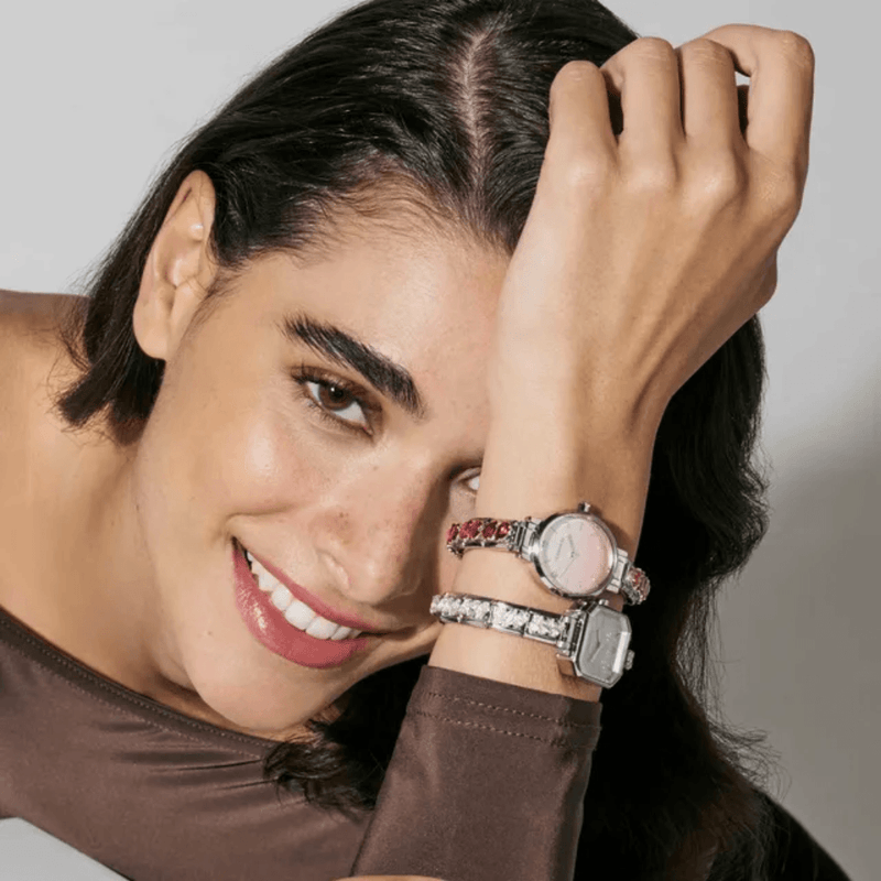 Model styling two Nomination watches with personalised Composable straps