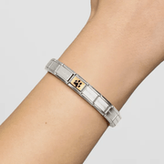 Nomination Gold Paw Print Charm worn on a Composable Classic bracelet