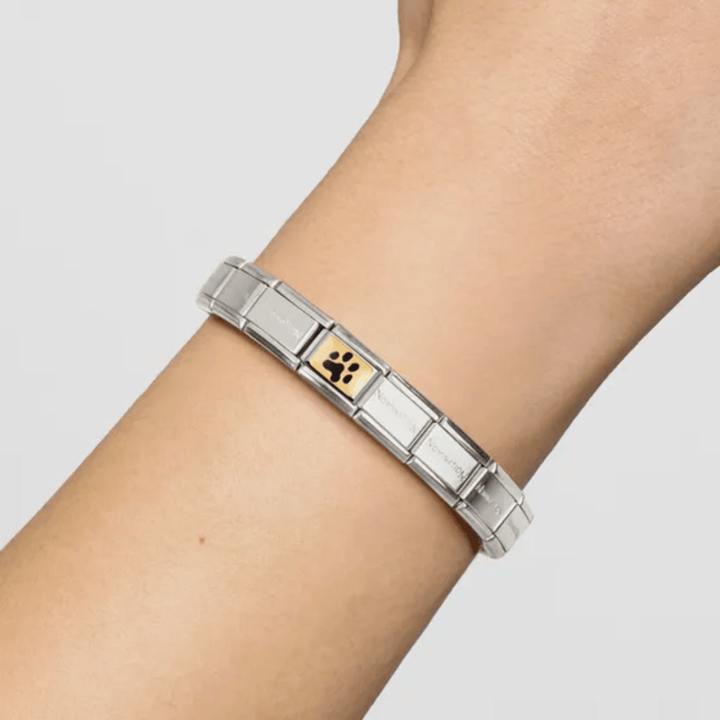 Nomination Gold Paw Print Charm worn on a Composable Classic bracelet
