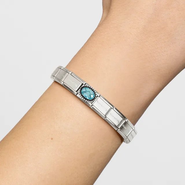 Nomination Classic Link bracelet with light blue oval cubic zirconia charm on wrist