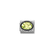 Light green oval cubic zirconia Nomination Classic Link charm with beaded silver frame, close-up