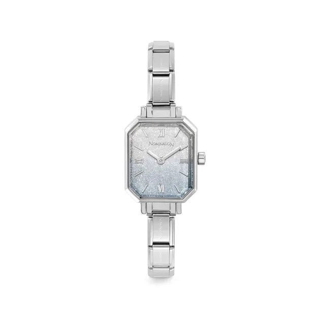 Nomination Time watch with octagonal case and light blue–silver glitter dial on stainless steel Composable strap, front view.