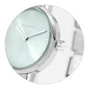 Close-up of sage green sunray dial and cubic zirconia crown on Nomination Paris Oval Watch