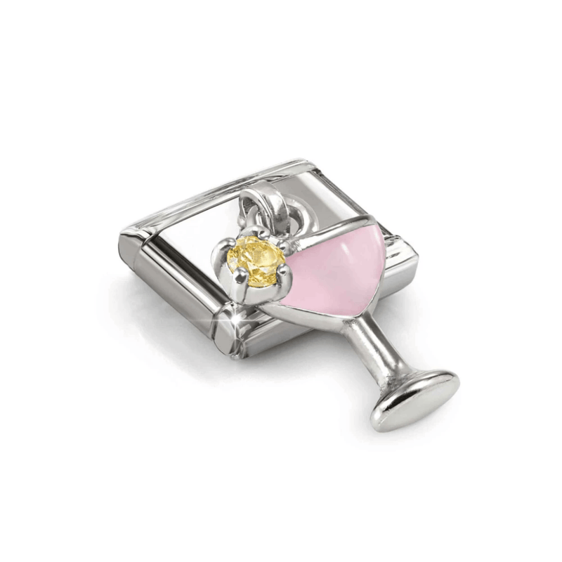 Close-up angled view of Nomination silver cocktail pendant with pastel pink enamel and sparkling golden-yellow CZ