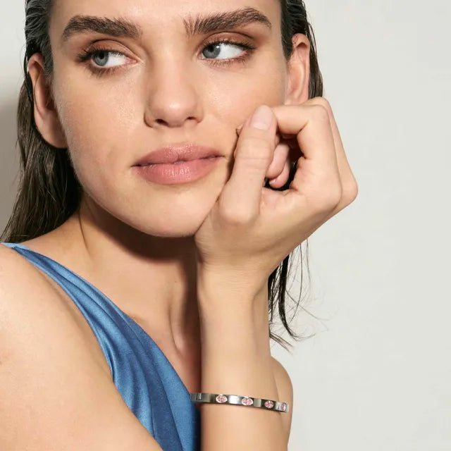 Model wearing a Nomination Pretty Bangles stainless-steel bracelet with oval rose Cubic Zirconia stones.