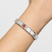 Nomination red ladybird charm worn on a Classic Composable bracelet
