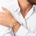 Man wearing Nomination Composable Classic bracelet with rose gold and black enamel links