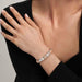 Woman wearing Nomination Composable Classic bracelet with rose gold links, lifestyle