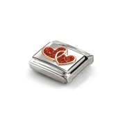 Angled close-up of Nomination Rose Gold Double Hearts Link showing raised intertwined hearts with red glitter enamel on stainless steel.