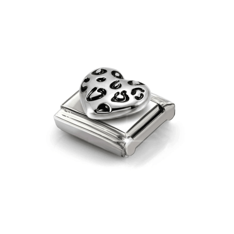 Angled close-up of Nomination Silver Leopard Heart Link showing its sculpted heart and contrasting black leopard-print enamel detail.